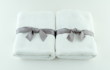 Fototapeta na wymiar Spa Towels Tied With Silk Ribbon