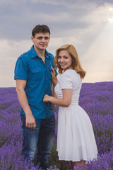 Happy young couple on lavender field