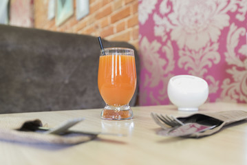 Fruit juice on  table in a cafe