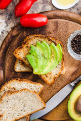toast with fresh avocado and pepper, healthy snack, vegetarian f