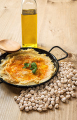 Homemade hummus with garlic and onions paprika