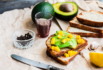 toast with fresh avocado and pepper, healthy snack, vegetarian