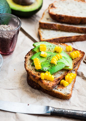 toast with fresh avocado and pepper, healthy snack