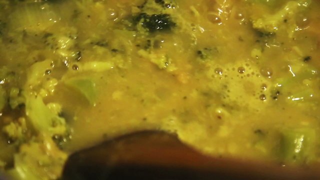 making of broccoli soup, beans and onions, on the stove