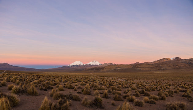 Sunset in Andes. Parinacota and Pomerade volcanos.