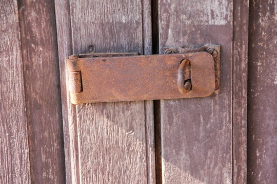 Old key on wood door