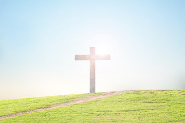 Background cross on grass
