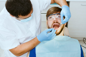 Obraz na płótnie Canvas Top view of dentist taking a dental attendance