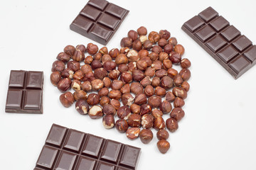 Chocolate and hazelnut forming a heart shape 