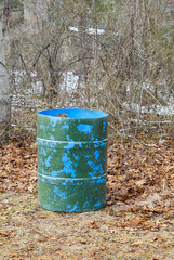 Camouflaged rubbish barrel