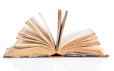 Old book open isolated on white background