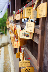 Wooden prayer tablets in a temple in Kurashiki, Japan