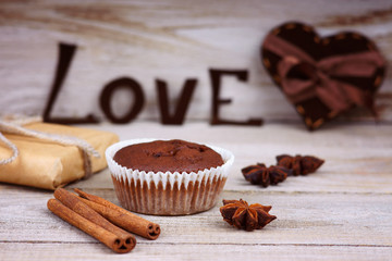 Chocolate muffin, gift box, heart shape and word love