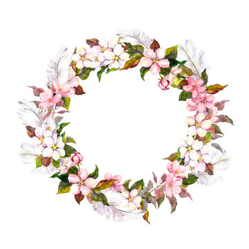 Vintage border wreath with blossom flowers (cherry, apple flower) and feathers. Retro water color in shabby chic style