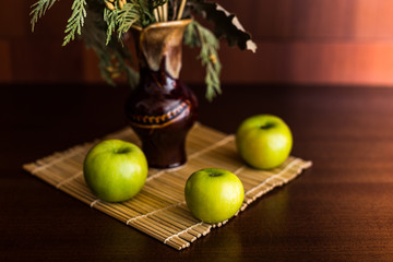 Still life vase and apples