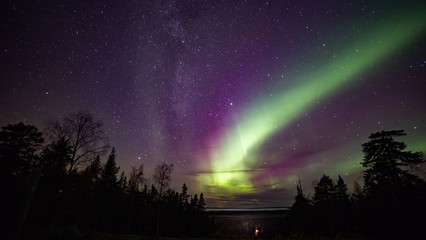 A beautiful green and red aurora dancing