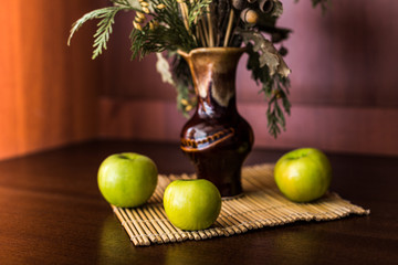 Still life vase and apples