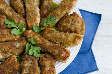 Fish fingers from salmon in cheese breadcrumbs