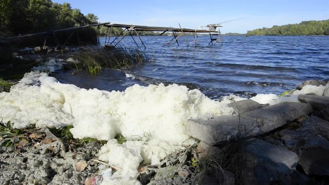 White foam pollution in the Dnieper river in Kiev