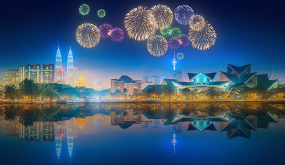 Fototapeta premium Beautiful fireworks above cityscape of Kuala Lumpur skyline