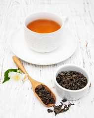 Cup of tea with jasmine flowers