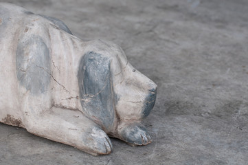 Wooden dog painted in white and grey