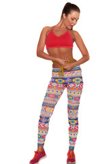 Young slim fit girl with sporty figure measuring her waist with soft meter isolated on a white backdrop