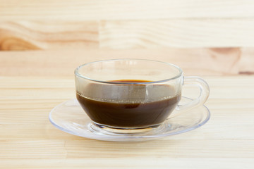 Coffee Mug on Wooden Table.
