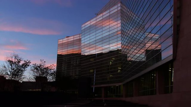 Pink Clouds Reflected in Office Building Windows