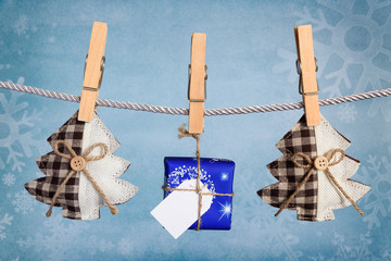 Christmas gift box hanging on clothesline
