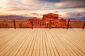 skyline,wooden platform in red sandstone