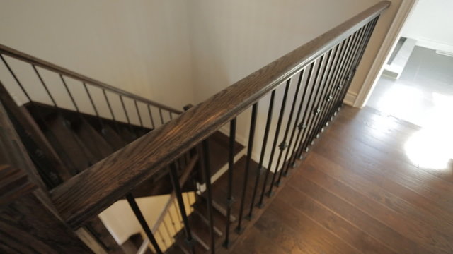 Motorized dolly shot of wooden stairs