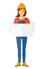 Engineer holding a blueprint.