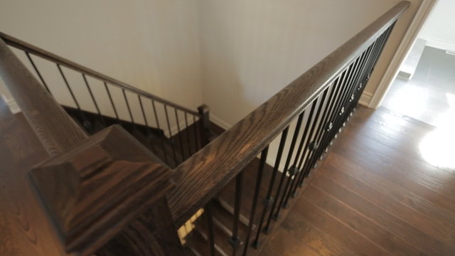 Motorized dolly shot of wooden stairs