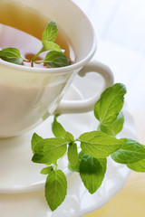 black tea with a fresh lemon and mint