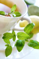black tea with a fresh lemon and mint