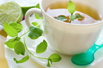 black tea with a fresh lemon and mint