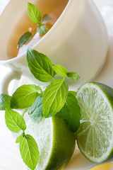 black tea with a fresh lemon and mint
