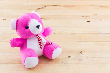 Pink teddy bear toy.