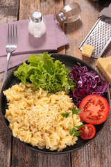 pasta with creamy cheese and salad