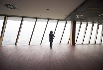 Fototapeta premium young successful woman in penthouse apartment