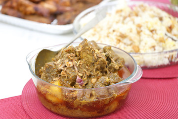 Subcontinent Bangladesh style beef curry in a glass bowl