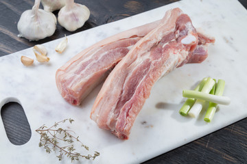raw pork belly on marble cutting board 3