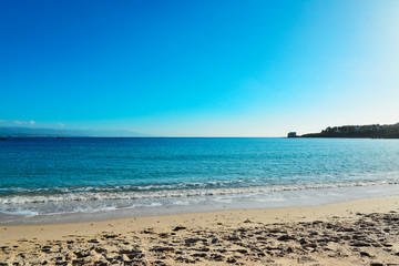 Fototapeta na wymiar Lazzaretto beach shore under a clear sky