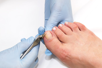 Obraz premium process of pedicure at beauty salon