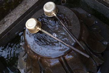 Water for wash before entering the shrine by Japanese tradition