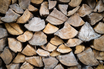 Fototapeta premium Firewood piled a lot background