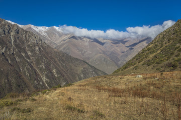 Fototapeta premium The panorama of mountain landscape of Ala-Archa gorge in the sum