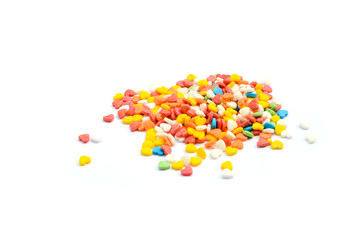 colorful heart shape cake sprinkles for cake decoration isolated in white background