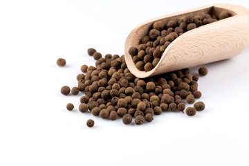 Wooden shovel with black peppercorn